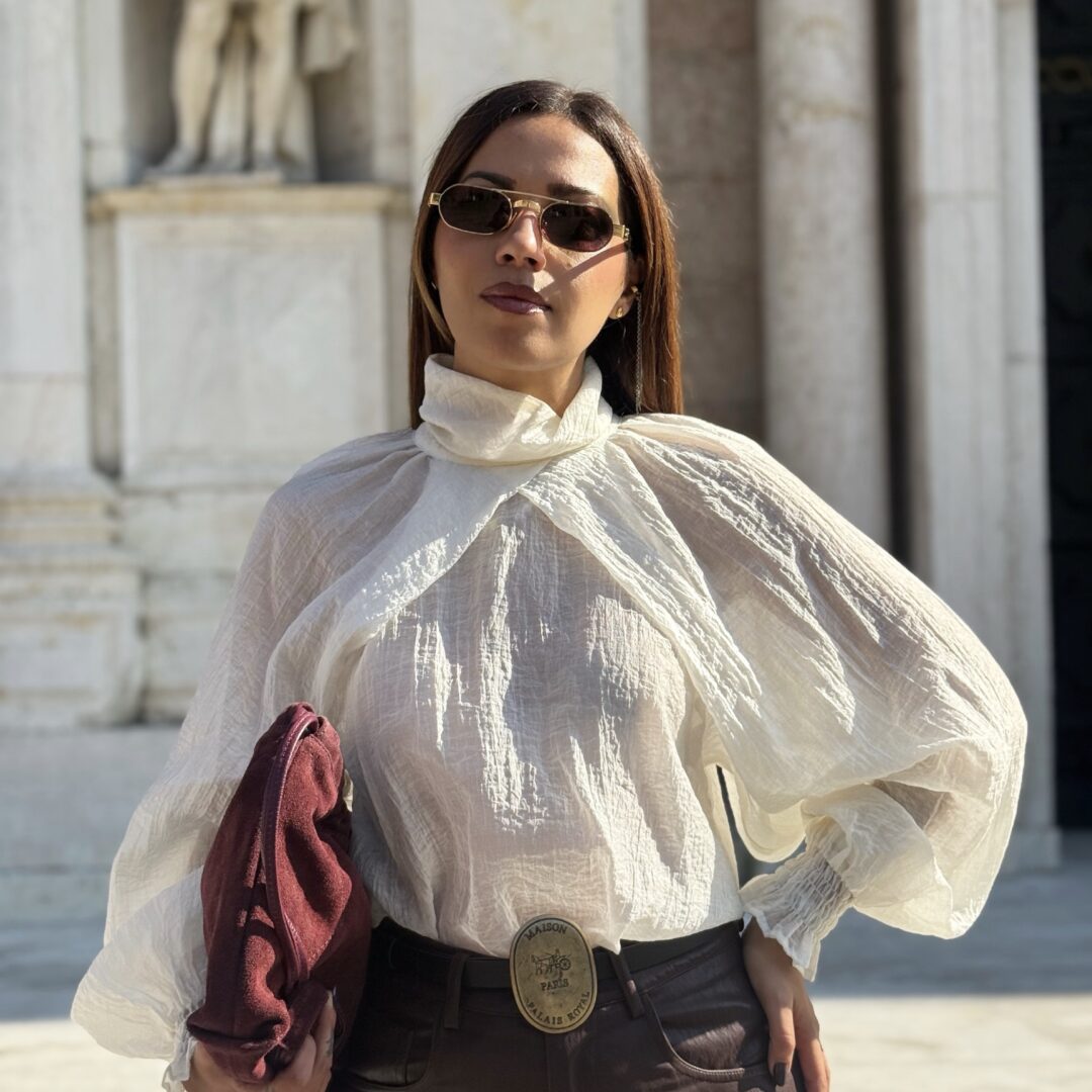 Blusa collo alto
